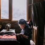 Seamstress in Sapa, 2025. by Pierandrea Fischetti, exhibited at Aurea Photo Gallery.