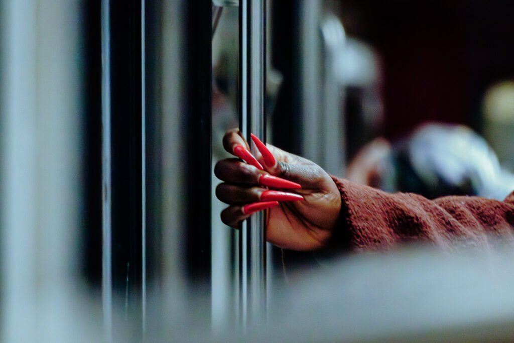 Red Nails, 2026. by Delutu, exhibited at Aurea Photo Gallery.