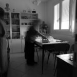 Paolina ironing, 2026. by Nicola Fantin, exhibited at Aurea Photo Gallery.