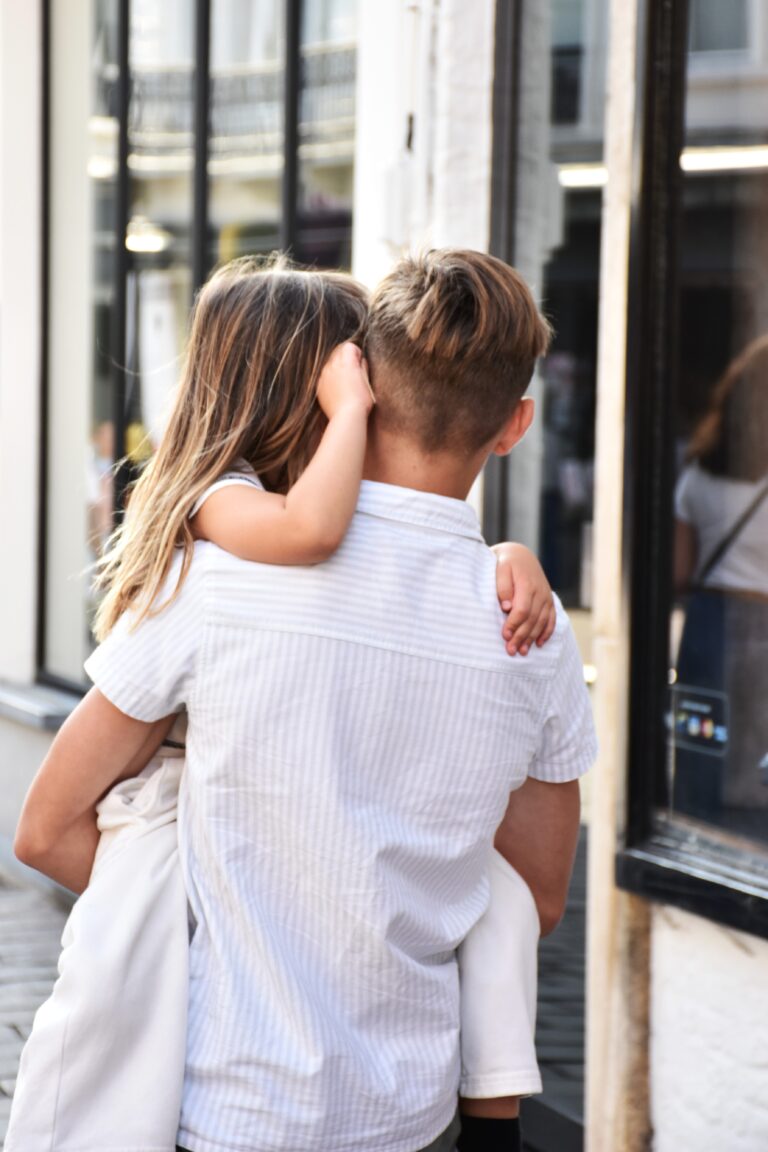 Holding my sister, 2025. by foto.m, exhibited at Aurea Photo Gallery.