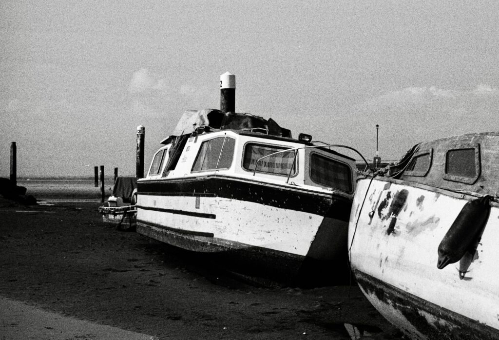 Beached Boats, 2024. by J.Y. Huang, exhibited at Aurea Photo Gallery.