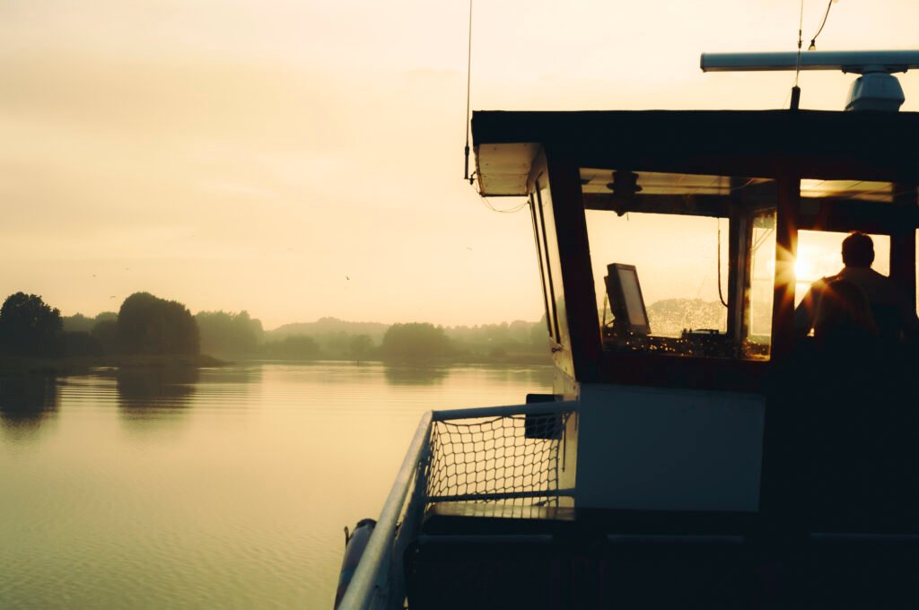 Sailing into the Sunset along the Schlei 1, 2026. by In Hoo Choi, exhibited at Aurea Photo Gallery.
